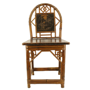 CHINESE INSPIRED BAMBOO CHAIR WITH A CARVED BACK PANEL